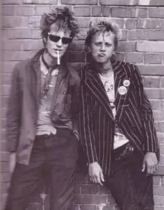 Two males - Punk Fashion - Ties, chains, ripped clothes, jackets and chains - classic Punk fashion